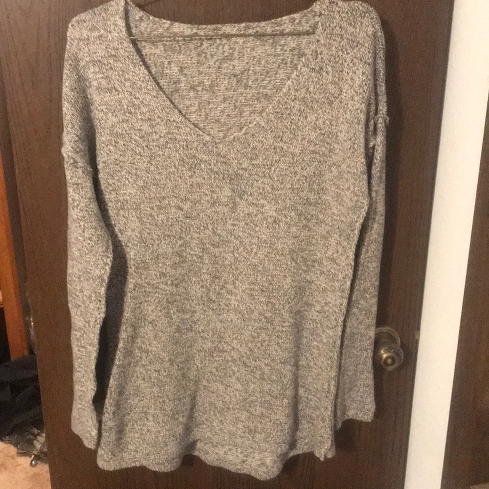 White and black specked sweater